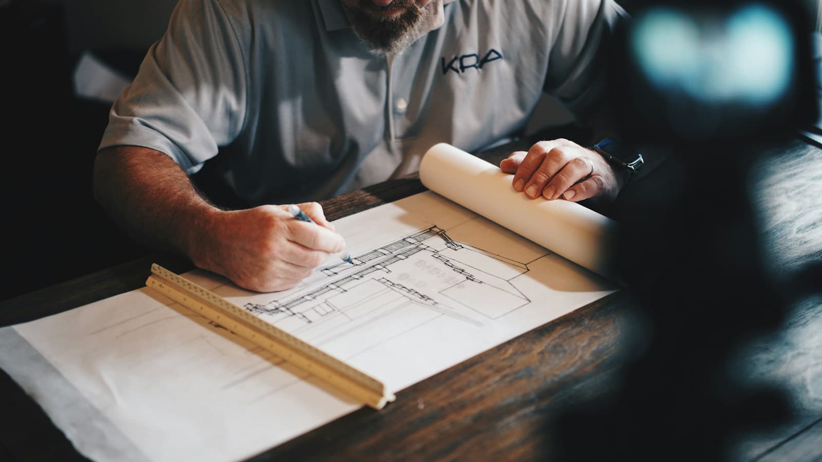 Architect drafting precision millwork by hand